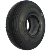 Angled view of the 10 x 3 in. (3.00-4) Kenda Ribbed Wheelchair / Scooter Tire in Black for mobility chairs