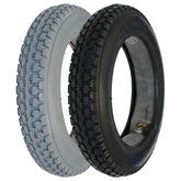Angled view showing 12 1/2 x 2 1/4 in. (62-203) Primo Power Express Wheelchair Tire in black and gray