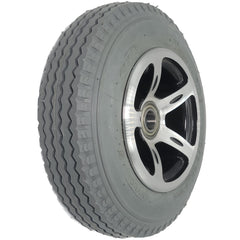 Angled view of the 2.80/2.50-4 Merits Foam Filled Caster Wheel for Atlantis and Travel-Ease Commuter Wheelchair showing sawtooth gray tread