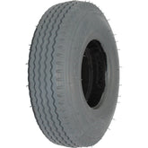 Angled view of 2.80/2.50-4 Primo Power Edge Foam Filled Wheelchair and Scooter Tire showing sawtooth tread