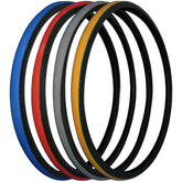 Angled view 24 x 1 in. (25-540) Primo V-Trak Wheelchair Tire showing blue, red, gray and yellow colors