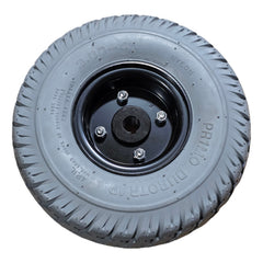Front view of the 3.00-4 Primo Durotrap Drive Wheel For The Jazzy Select 6 features an assembled gray tire and 7 spoke rim. Pride Mobility part WHLASMB1728