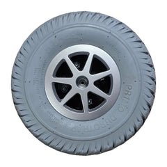 Front view of the 3.00-4 Primo Durotrap Drive Wheel For The Jazzy Select 6 features an assembled gray tire and 7 spoke rim. Pride Mobility part WHLASMB1728
