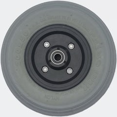 Back view of 8 x 2 in. (200x50) Foam Filled Ribbed Pr1mo Spirit Caster Wheel Assembly showing Standard rim 27 5x93 N.H.S markings