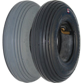 Angled view of the 8 x 2 in. (200 x 50) Primo spirit pneumatic wheelchair and scooter tire shown in gray and black color
