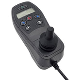 Angled view of the Q-Logic NE+ Joystick For Pride Quantum Power Wheelchairs provides precise power chair control and features an easy-to-read data display, soft-touch buttons and charger port. Pride Part Number CTLDC1560
