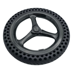 Close up view of the replacement 10.71-inch drive wheel assembly for Pride Jazzy Ultra Light power chair. Flat-free perforated tire with carbon fiber 3-spoke rim. Pride WHL2400187.