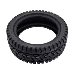 Angled view of the replacement 13x4.00-8 Primo Front and Rear Black Tire for Pride PX4 Electric Scooters fits the PX4, Pursuit Sport, and Pursuit XL 4-wheel scooters. Made from Nylon, CST and 4P.R.