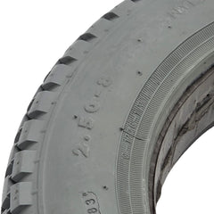 Close up view of the 2.50-8-Primo-Power-Plant-Foam-Filled-Wheelchair-Tire close up showing gray C-177G tread