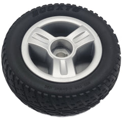 Front view of the 200x75 Drive Wheel Assembly for the Merits EZ GO Wheelchair showing the stylish silver rim and black tire