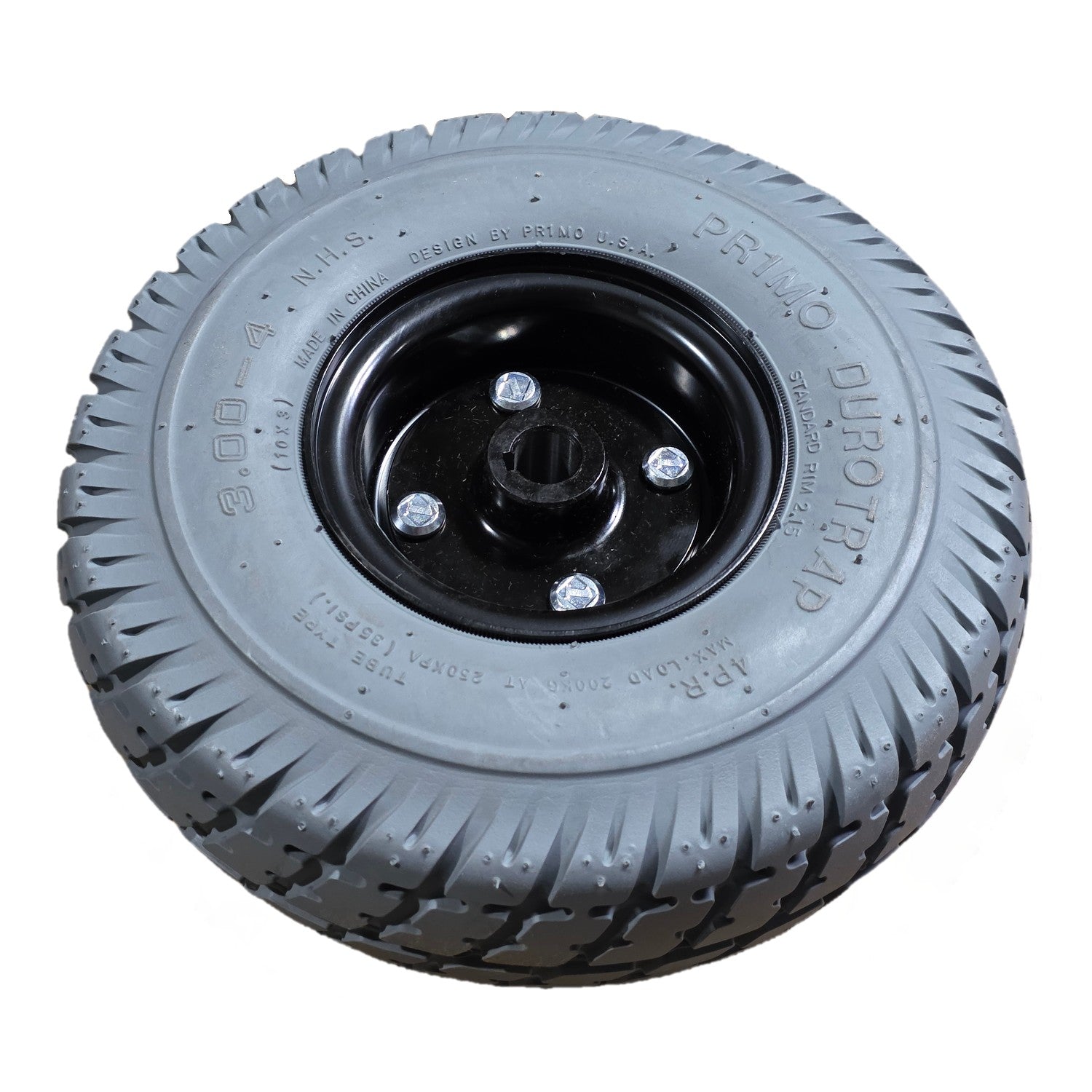 Angled view of the 3.00-4 Pr1mo Durotrap Drive Wheel For The Jazzy Select 6 features an assembled gray tire and 7 spoke rim. Pride Mobility part WHLASMB1728