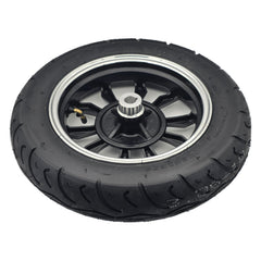 Close up view of the replacement 3.00-10 Rear Drive Wheel For Pride Baja Raptor 2 Mobility Scooter comes ready to install with metal rim and black tire.