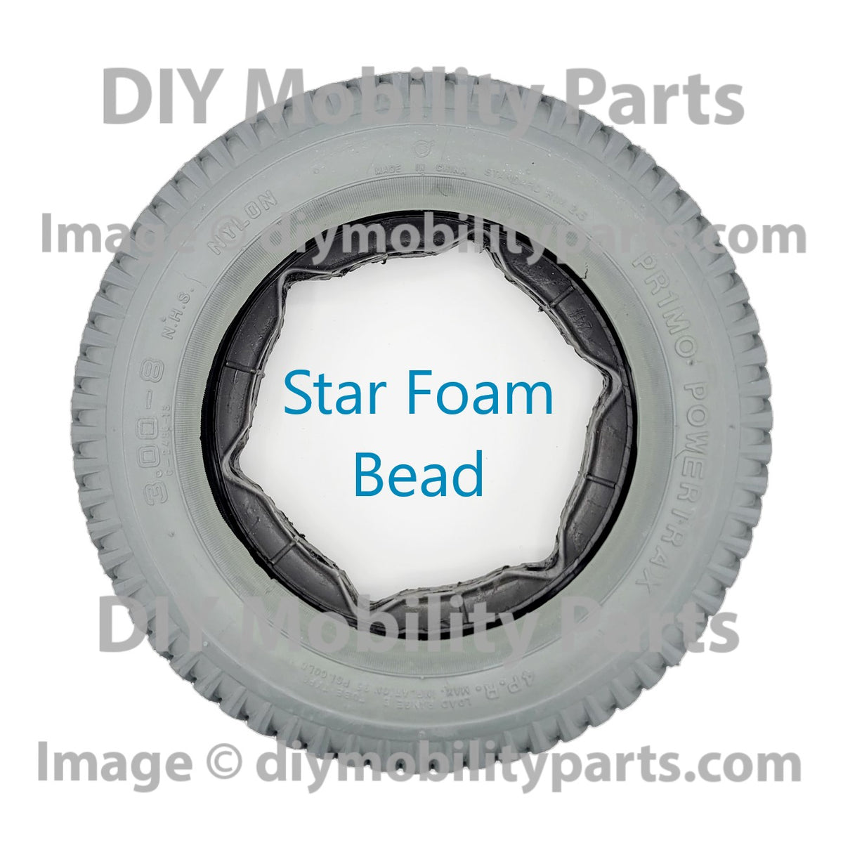 3.00-8 (14 x 3 in.) Primo Powertrax foam filled solid flat free quantum q6 edge power wheelchair tire, star foam filling, and C248 knobby tread pattern.