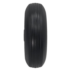 Close up view of the replacement 2.50-3 (210-65) black Caster Wheel for Permobil F3, F5, and M5 Power Wheelchairs showing rib tread