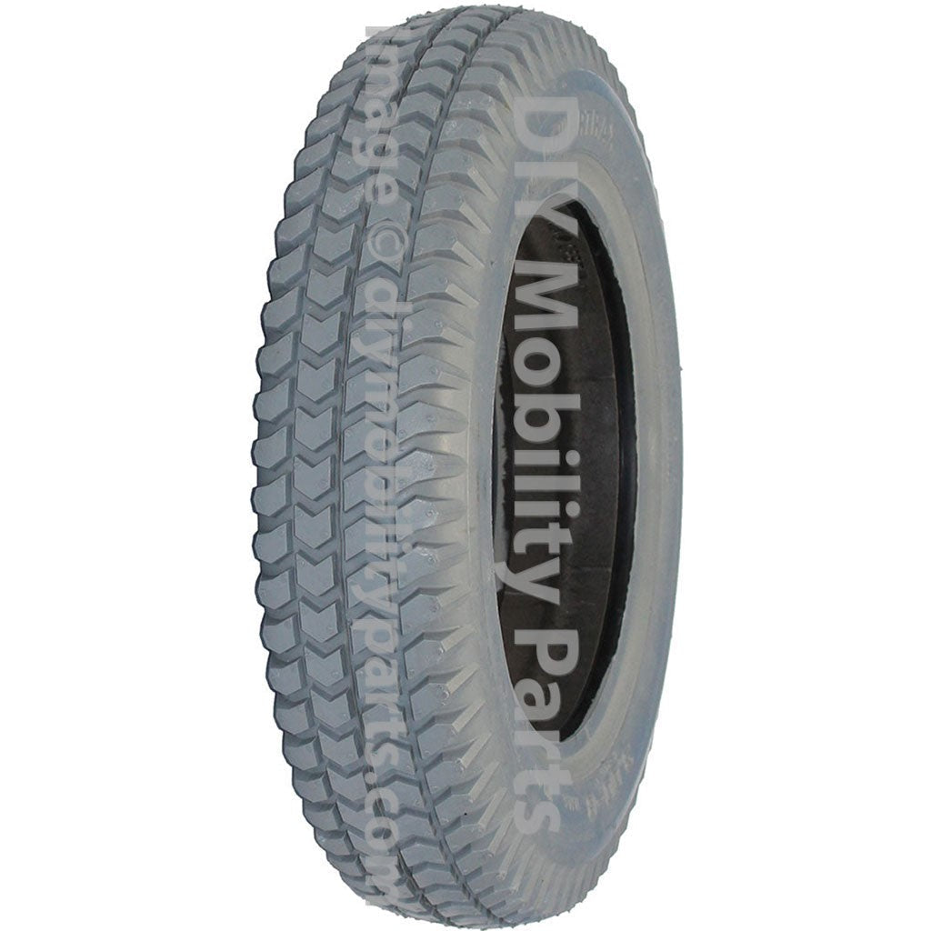 3.00-8 (14 x 3 in.) Primo Powertrax foam filled solid flat free power wheelchair tire with C248 knobby tread pattern.